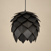 Black sculptural pendant light inspired by the shape of an artichoke, featuring overlapping textured panels, a rounded silhouette and black suspension cord against a warm beige background.