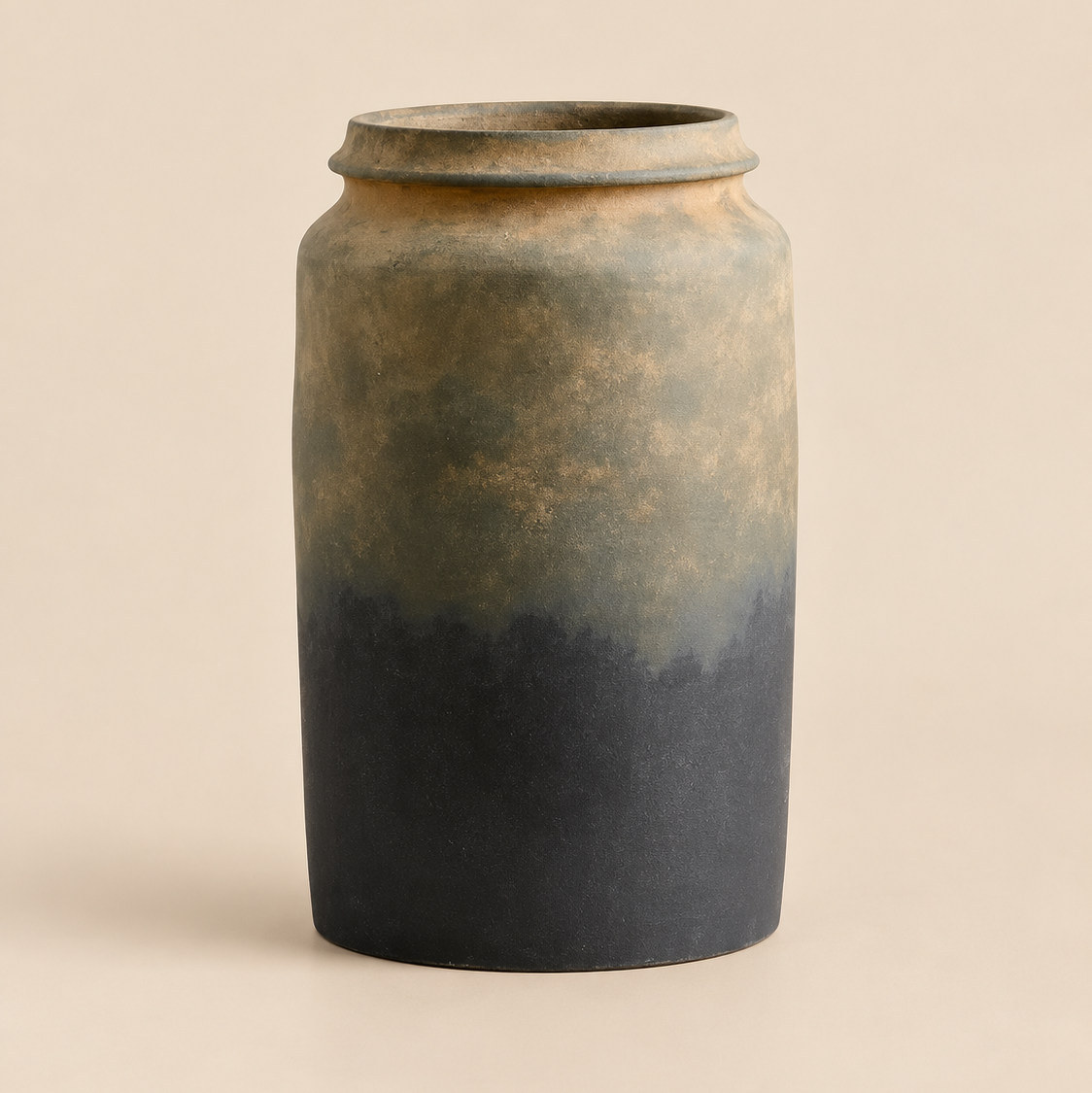Black and bronze decorative vase with aged textured finish.