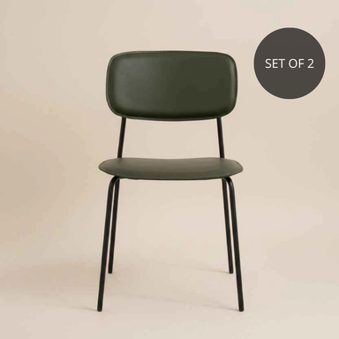 Green modern dining chair with a padded seat, curved backrest and slim metal legs.