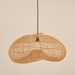 Sculptural natural rattan pendant light featuring an intricate open-weave design, organic curved silhouette and black suspension cord against a warm beige background.