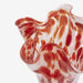 Pink and red speckled glass vase with a sculptural wavy rim.