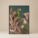 ramed vintage green parrot print with decorative pink leaves and tropical foliage.