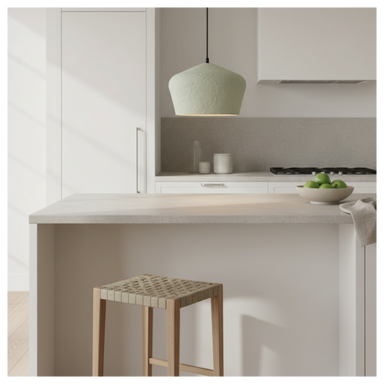 Eco-friendly olive cotton maché lamp shade styled in a contemporary living space with warm ambient lighting.