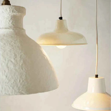 Close-up of the handcrafted cotton maché texture and artisanal finish of the lampshade.