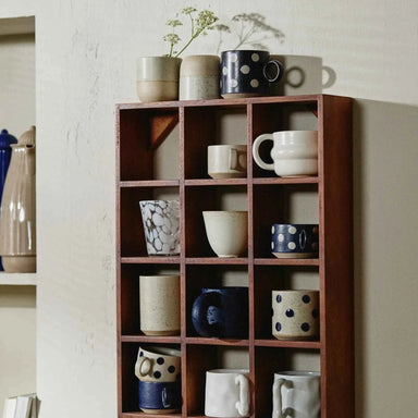 Close-up of the natural glaze highlighting the craftsmanship of the handcrafted Danish espresso mug.