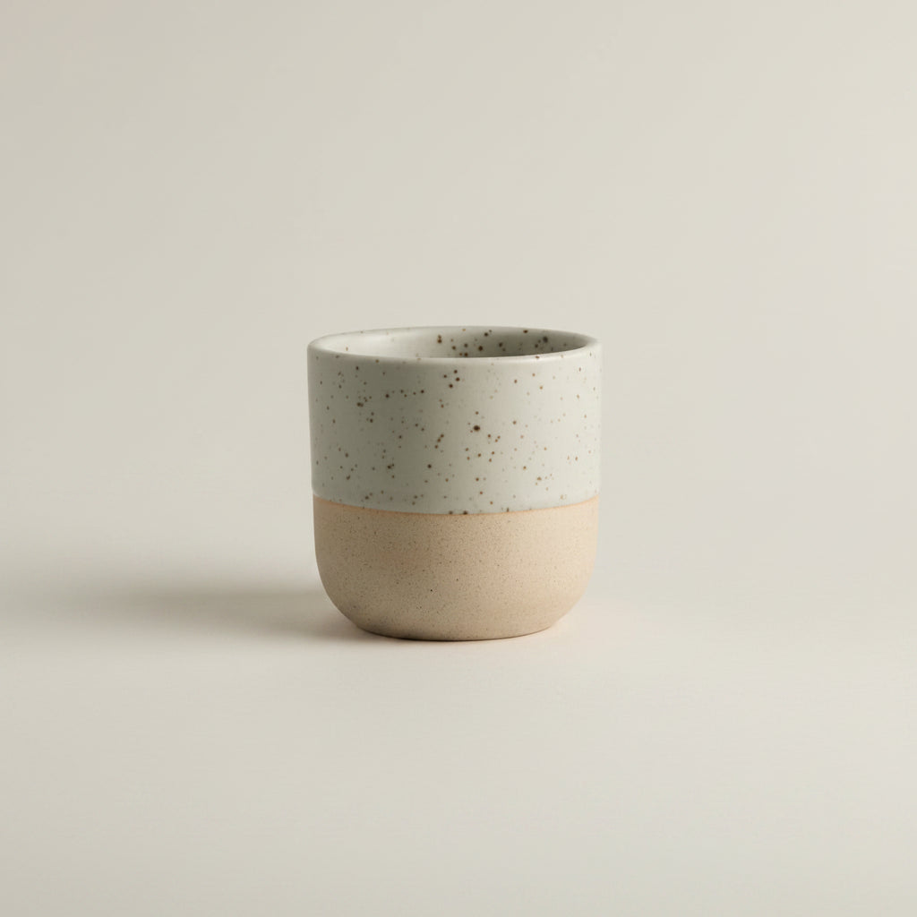 Handcrafted Danish espresso mug with a timeless stoneware design and natural artisan finish.