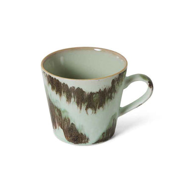 Close-up of the reactive glaze and handcrafted finish on the HKLIVING light green cappuccino mug.