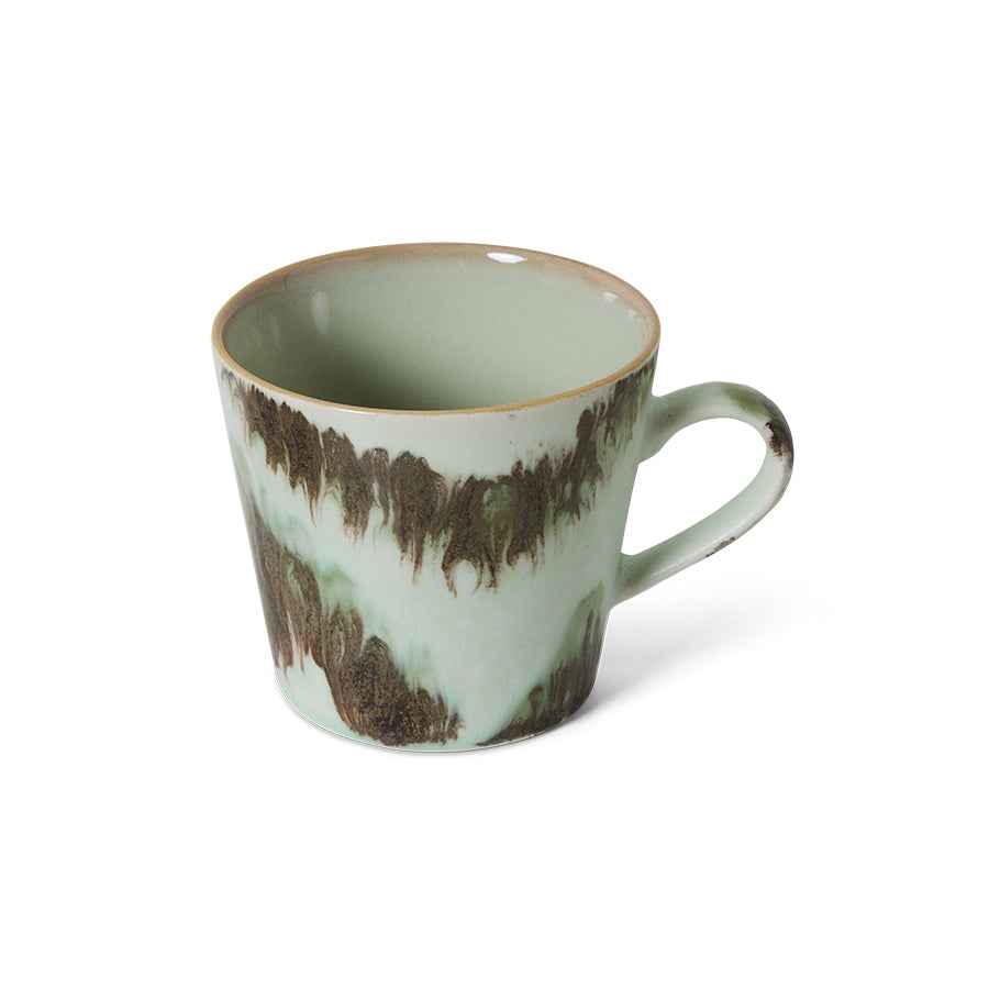 Close-up of the reactive glaze and handcrafted finish on the HKLIVING light green cappuccino mug.