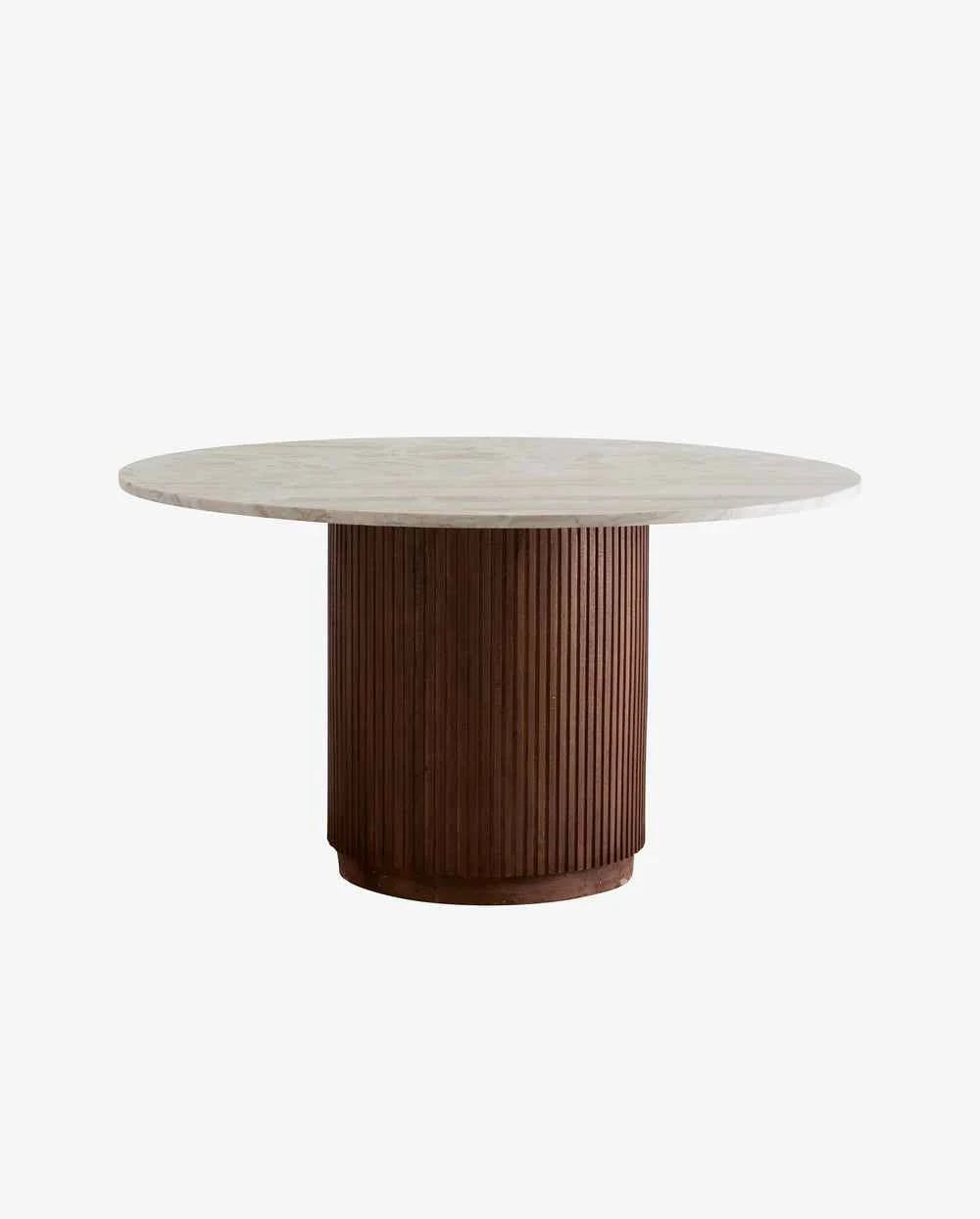 Close-up of the natural beige marble surface showcasing the craftsmanship and refined finish of the dining table.