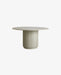 Natural beige round marble dining table with a timeless design and elegant stone finish.