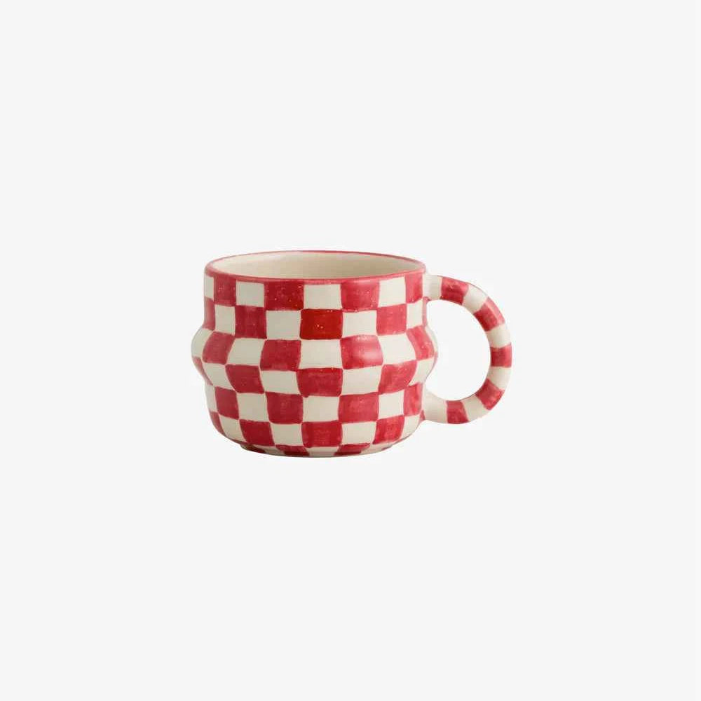 Red and white oval checker mug crafted from ceramic with a bold contemporary pattern and glossy finish.