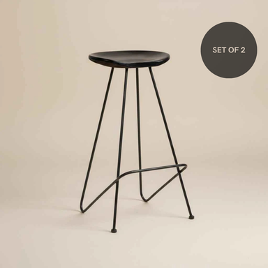 Set of 2 minimalist black iron bar stools with a contemporary design and clean, modern lines.